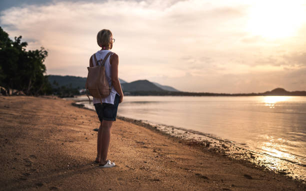 istock Young woman watching the sunset 851868262