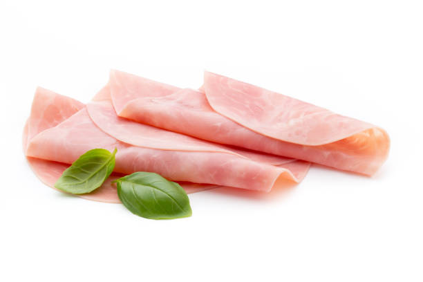 istock Thin slices of ham on white background. 851869842
