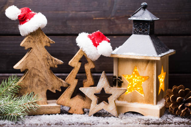 istock Burning lantern and christmas decoration in the evening. 851870908