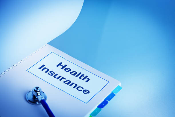 istock Health Insurance Policy Manual with Stethoscope 851871530