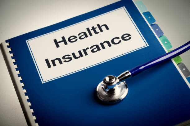istock Health Insurance Policy Manual with Stethoscope 851871532