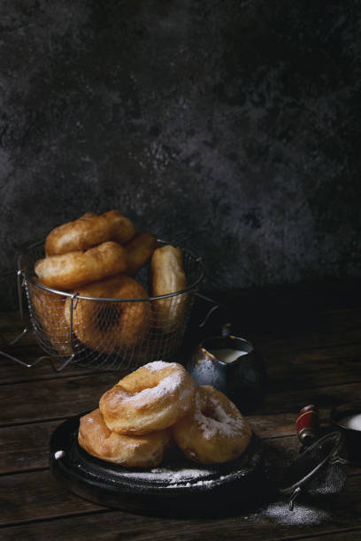 istock Homemade donuts with sugar powder 851878042