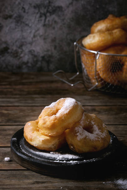 istock Homemade donuts with sugar powder 851878074