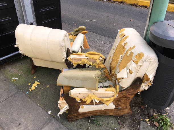 istock Damaged armchairs left in the street 851878220