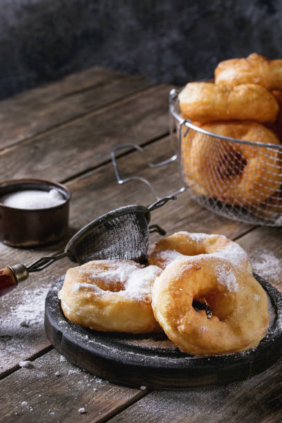 istock Homemade donuts with sugar powder 851878392