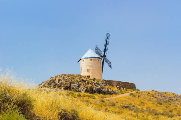 istock famous windmills in consuegra Spain bright summer sunny day / windmills in consuegra Spain. 851881840