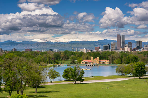 Denver City Park and a white top of Mt. Evans Denver, Colorado, USA front range mountain range stock pictures, royalty-free photos & images