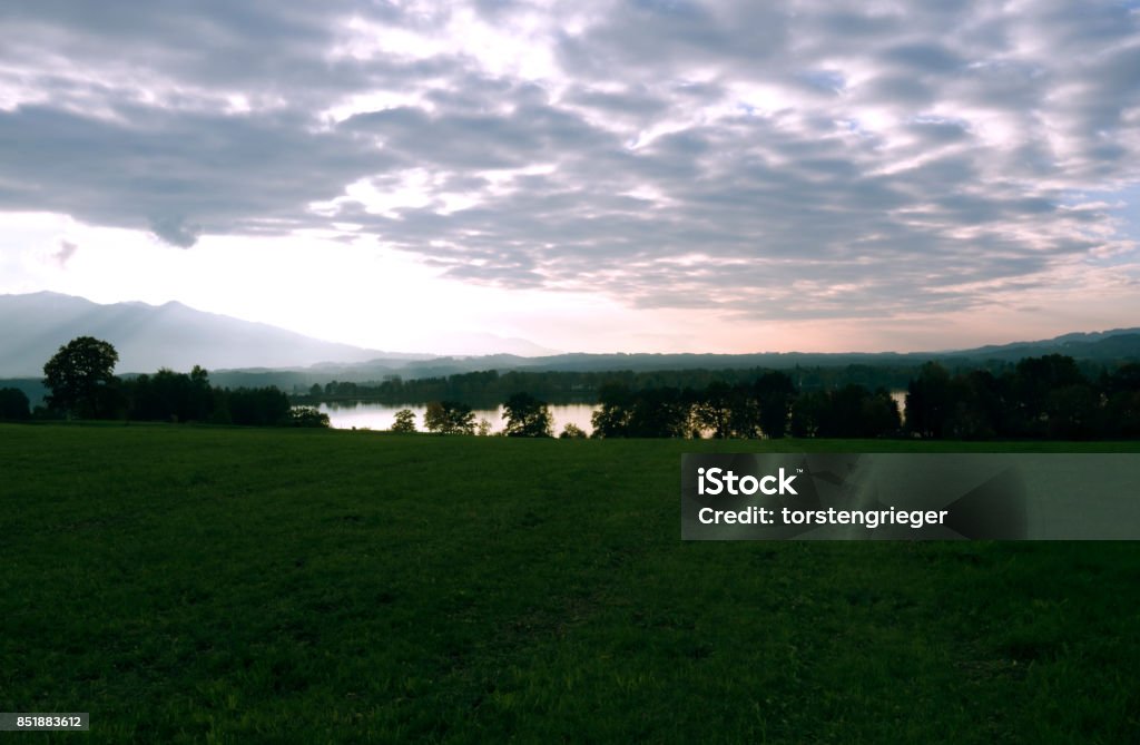Germany: Autumnal evening mood in Upper Bavaria Autumnal evening mood near Seehausen-Rieden with view over the Staffelsee to the northern fringe of the Alps Alpine climate Stock Photo