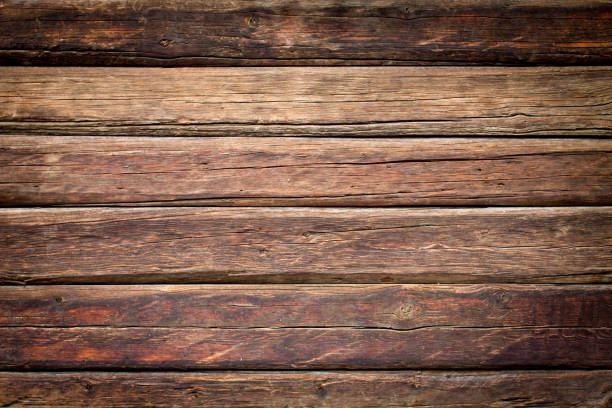 istock Wooden red planks and boards with dark fade background texture 851884152