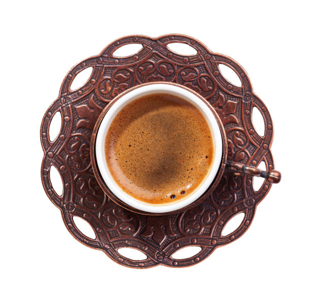 traditional cup of turkish coffee with foam isolated on white background. top view. - coffee table non alcoholic beverage turkish coffee black coffee imagens e fotografias de stock