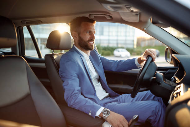 istock businessman going on business trip by car 851889250