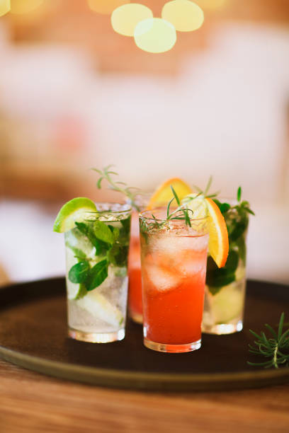 istock Two cocktail glasses on tray in the bar 851892072