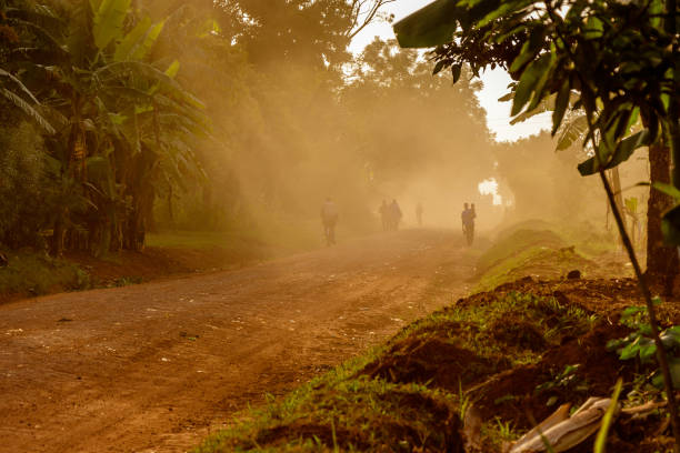 Dusty road A very dusty road around the Sipi falls in the Mount Elgon national park in Uganda extinct volcano stock pictures, royalty-free photos & images