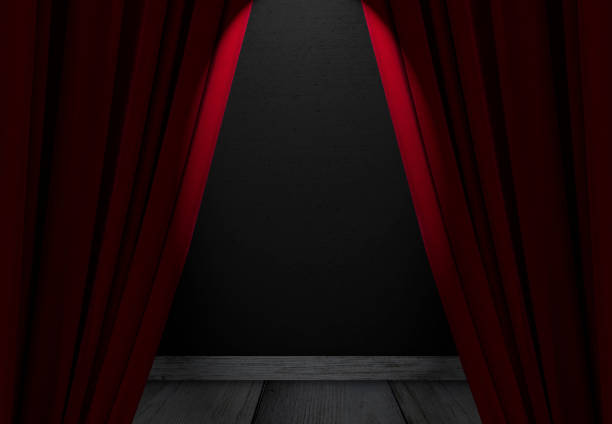 istock Red curtains at a theatre with half light for text or other ideas 851898084