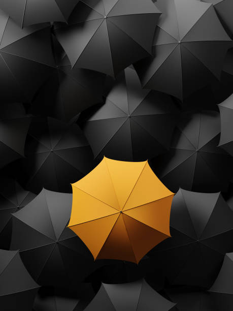 istock Yellow Umbrella Standing Out From The Crowd 851907334