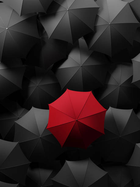 ombrello rosso in piedi dalla folla - standing out from the crowd individuality umbrella contrasts foto e immagini stock