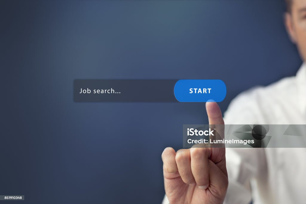 Online job search. Man searching job on the internet. Looking for job online and search button on virtual touch screen. Recruitment Stock Photo