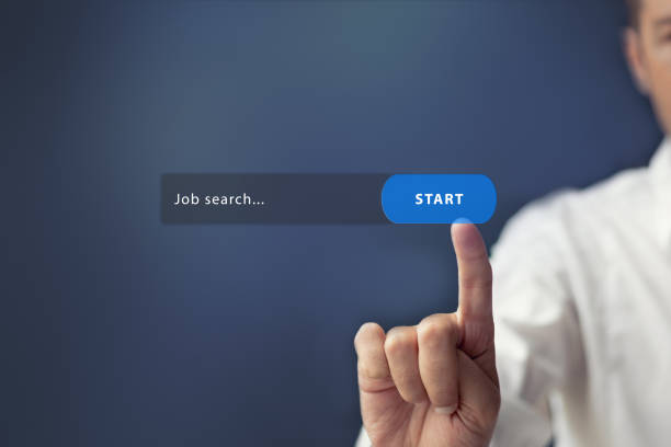 Online job search. Man searching job on the internet. Looking for job online and search button on virtual touch screen. job search stock pictures, royalty-free photos & images