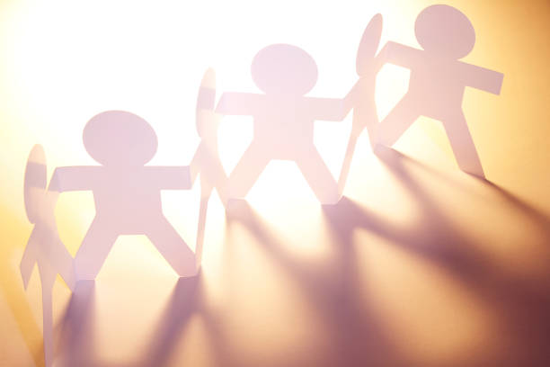 istock Paper chain team united 851910842
