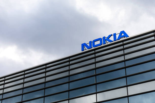 Dark clouds over Nokia logo on top of a building stock photo