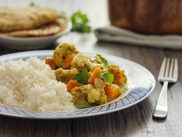 Vegetarian curry with rice and naan bread