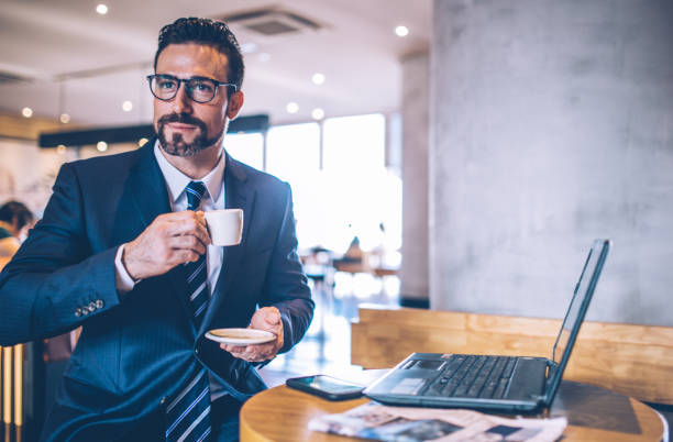 istock Businessman drinking coffee 851917750