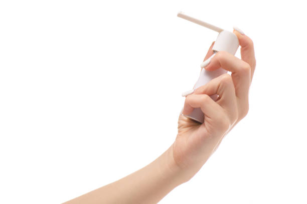 istock Female hand spray for throat 851921406