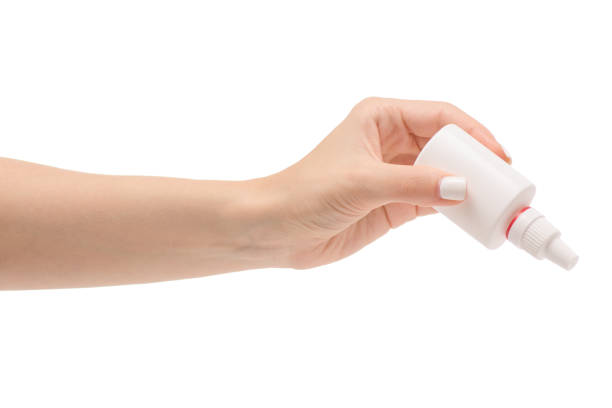 istock Female hands medicine nose spray 851921710