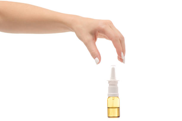 istock Female hands medicine nose spray 851921774