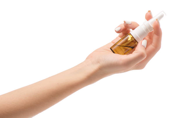 istock Female hands medicine nose spray 851921784