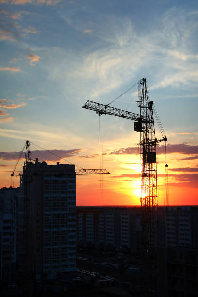 istock Silhouette of a tower crane 851928482