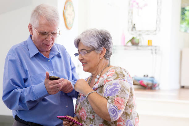 istock Senior brazilian couple texting on a smartphone 851937370