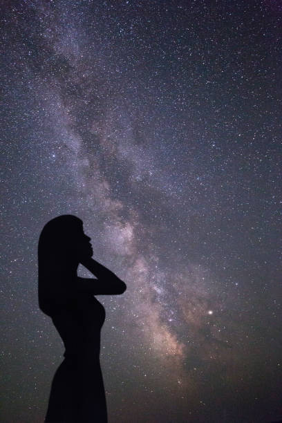 istock woman under the Galaxy 851939398