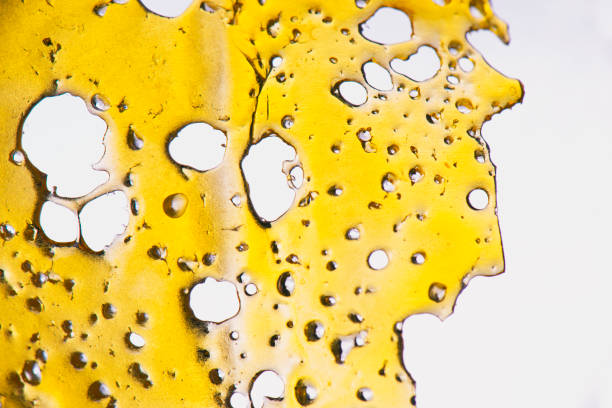 Cannabis oil concentrate aka shatter isolated stock photo
