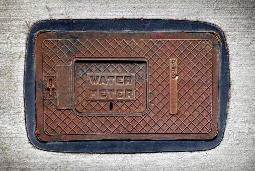 rusted water meter access cover