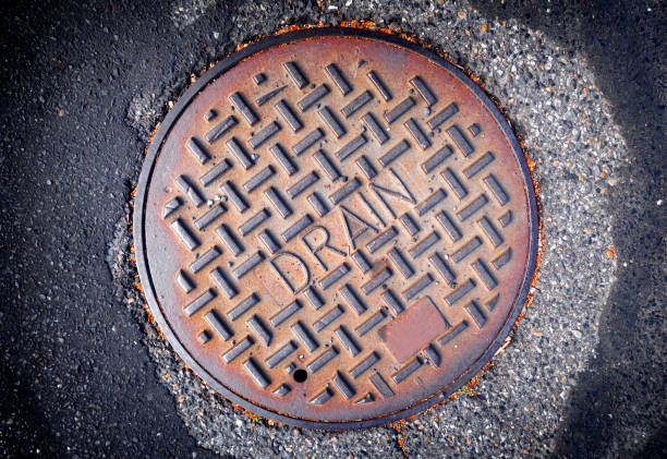 istock rusted metal manhole cover 851943006