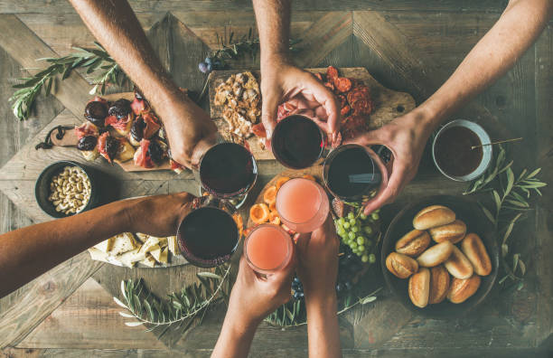 istock Flat-lay of friends eating and drinking together, top view 851943236