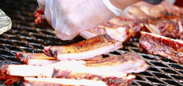 istock barbecue ribs and sausage on the grill 851950740