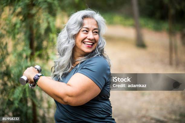 Senior Mexican Woman Working Out Stock Photo - Download Image Now - Exercising, Women, One Woman Only