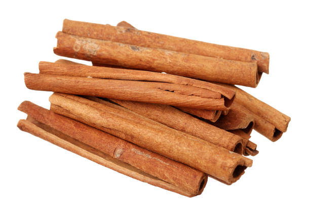istock Cinnamon sticks closeup  on the white background 851960204