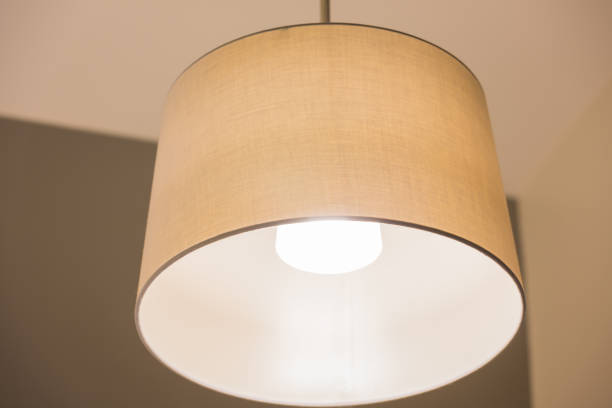 istock Light bulb and cream lamp as interior design concept. 851967444