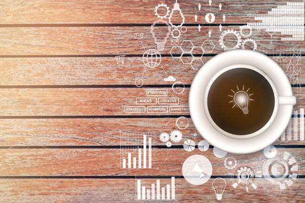 fresh coffee on the table with graph and business strategy sketches