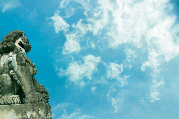istock Stone lion carving and sky background 851972002