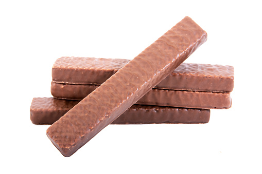 Chocolate protein bar on white background