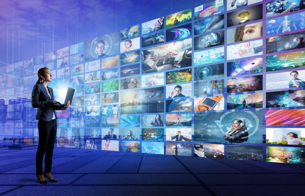 istock young woman using laptop PC and various pictures. internet streaming service concept. 851980848
