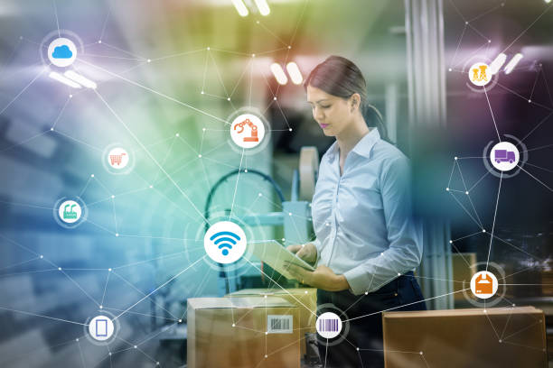 industry and Internet of Things concept. woman working in factory and wireless communication network. Industry4.0. industry and Internet of Things concept. woman working in factory and wireless communication network. Industry4.0. radio frequency identification stock pictures, royalty-free photos & images