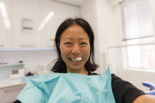 istock Female patient at dentist 851989988