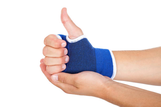 istock Male hand with elastic bandage thumbs up 851990214