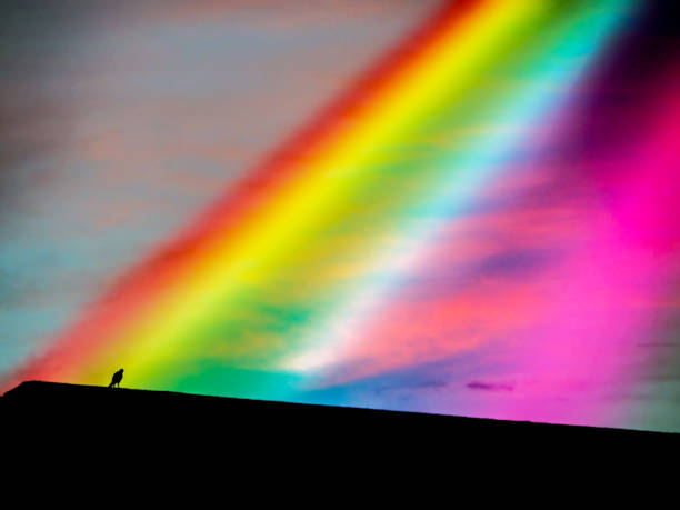 istock rainbow of god from heaven to bird on roof 851992392