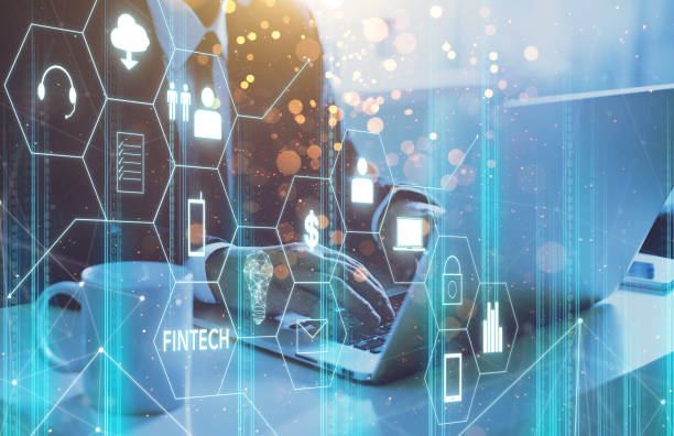 istock Businessman with fintech icon and internet of things with matrix code background, Investment and financial internet technology concept. 852000272